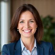 Portrait of Dr. Elena Petrova, a wellness psychologist.